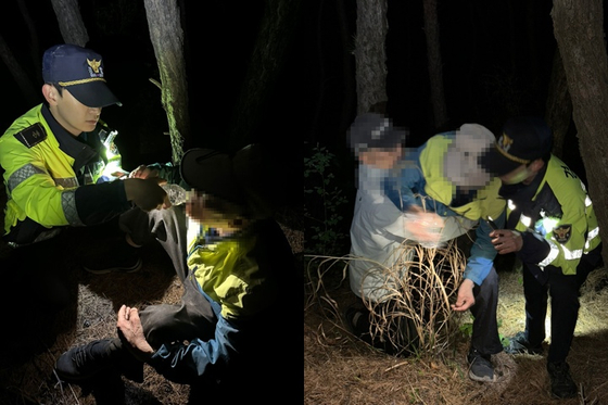 지난 4일 오후 10시 15분 대구 동구의 한 산에서 실종된 치매 노인이 경찰 수색으로 발견돼 가족의 품으로 돌아갔다. [사진 대구경찰청]