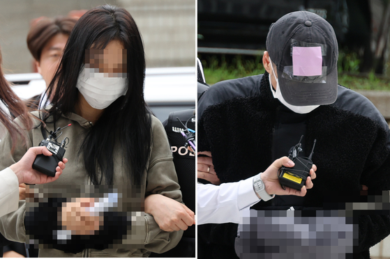 축구 국가대표팀 주장 손흥민의 아이를 임신했다고 주장하며 손씨에게 돈을 뜯어내려 한 20대 여성 양모씨(왼쪽)와 40대 남성 용모씨가 지난 17일 영장실질심사를 받기 위해 서울중앙지법에 들어서고 있다. 연합뉴스