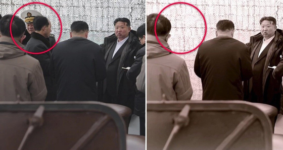 지난 13일 방영된 조선중앙TV의 5000톤급 신형 구축한 '강건호' 진수 관련 영상. 지난 3월 김 총비서의 현지지도 보도 때는 등장한 김명식 전 해군사령관의 모습(왼쪽 붉은 원 안)이 영상에선 삭제돼 있다. 사진 NK뉴스 캡처