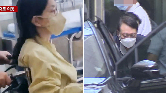 특별검사팀 출범을 앞두고 우울증 등 지병을 이유로 입원했던 김건희 여사가 지난달 27일 퇴원하는 모습. 이날 오후 서울아산병원에서 윤석열 전 대통령이 김 여사의 휠체어를 밀어줬다. 연합뉴스