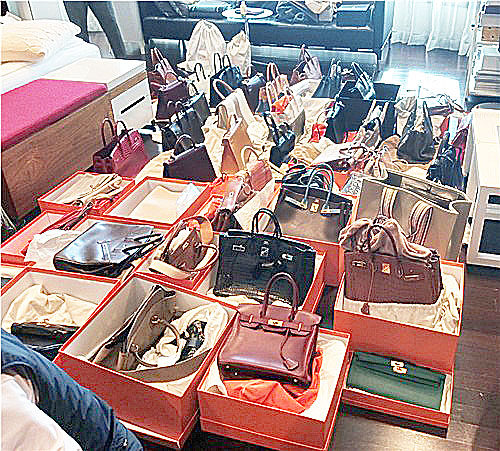  국세청은 지난달 20~31일 7개 광역자치단체와 공조, 재산은닉 혐의가 있는 고액·상습 체납자를 합동 수색했다고 10일 밝혔다. 세금을 100억원 넘게 체납한 A씨의 실거주에서 발견된 명품 에르메스 가방. 연합뉴스〉