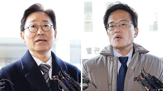  국회 ‘패스트트랙 충돌’ 사건에 연루된 더불어민주당 박범계, 박주민 의원이 28일 서울 양천구 서울남부지법에서 열린 1심 결심 공판에 출석, 취재진의 질문에 답하고 있다. 뉴시스