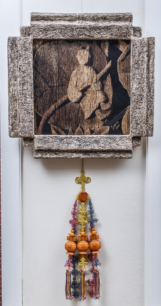 부산 범어사 독성전을 장식한 동자상의 실그림. 액자·매듭 모두 작품을 이룬다. 권혁재 사진전문기자