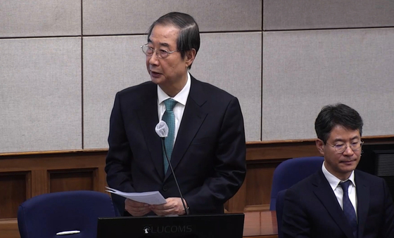 한덕수 전 국무총리가 지난달 26일 서울 서초구 서울중앙지법에서 열린 내란 우두머리 방조, 내란 중요임무 종사 및 위증 등 혐의 결심공판에서 최후진술을 하고 있다.   연합뉴스