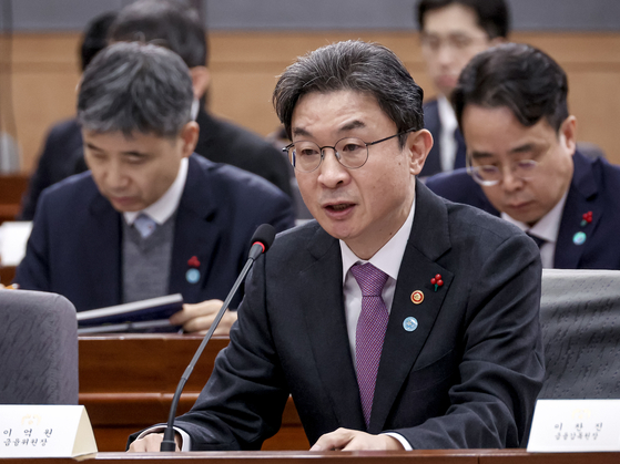 이억원 금융위원장이 19일 정부서울청사 별관에서 이재명 대통령에게 업무보고를 하고 있다. 대통령실사진기자단