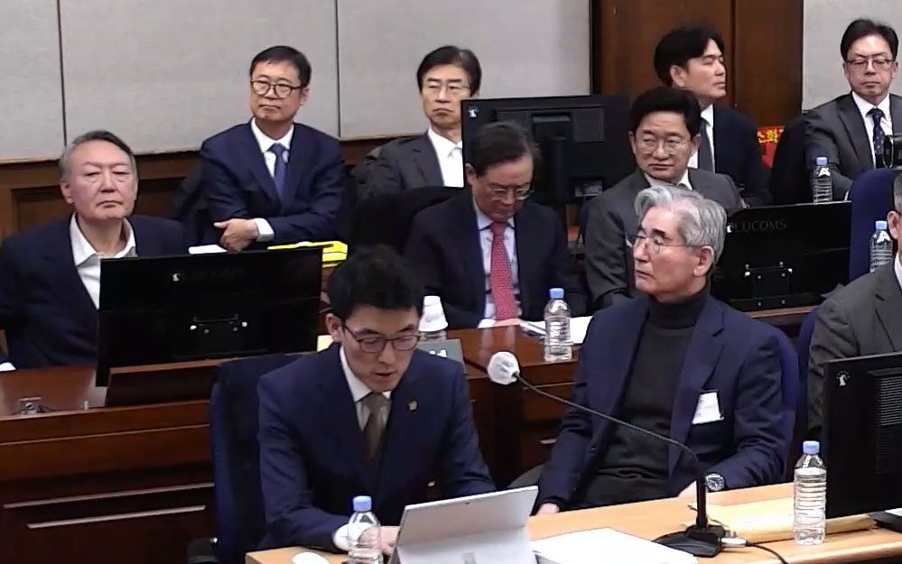 윤석열 전 대통령, 김용현 전 국방부 장관 등이 9일 서울 서초구 서울중앙지방법원에서 열린 내란 우두머리 혐의 1심 결심 공판에 출석해 자리에 앉아 있다. 뉴스1