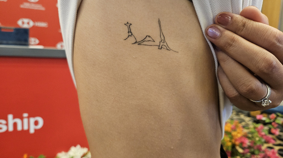 리디아 고가 새긴 올림픽 금은동 기념 문신. 리우와 도쿄, 파리에서 거둔 성과를 간직하기 위해 새겼다. 고봉준 기자