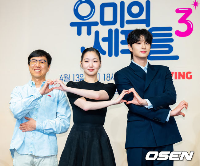 [OSEN=박준형 기자] 7일 오후 서울 신도림 더링크 호텔에서 티빙 오리지널 '유미의 세포들' 시즌3 제작발표회가 진행됐다.배우 김고은과 김재원이 출연하는 ‘유미의 세포들'은 스타작가가 된 유미의 무자극 일상 속 날벼락처럼 찾아온 뜻밖의 인물로 인해 다시 한번 웃고 울고 사랑에 빠지는 세포 자극 공감 로맨스를 그렸다. 오는 13일 공개.이상엽 감독과 배우 김고은, 김재원이 포즈를 취하고 있다.    2026.04.07 / soul1014@osen.co.kr