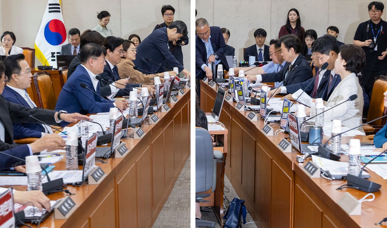 26일 국회에서 열린 행정안전위원회 전체 회의에서 더불어민주당 의원들과 국민의힘 의원들이 정원오ㆍ오세훈 서울시장 후보 비판이 적힌 종이를 상임위 노트북에 붙인 이후 여야 간사단 합의를 통해 다시 떼고 있다. 연합뉴스