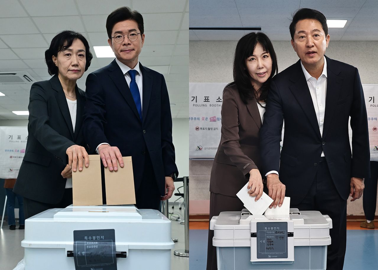 더불어민주당 정원오 서울시장 후보(왼쪽)와 국민의힘 오세훈 서울시장 후보가 제9회 전국동시지방선거 사전투표 첫날인 29일 오전 배우자와 함께 각각 사전투표소인 소공동 행정복합청사와 한남동 주민센터에서 한 표를 행사하고 있다. 뉴스1