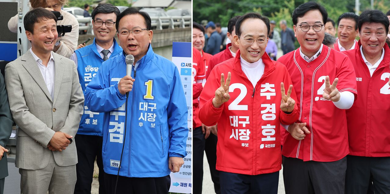 김부겸 더불어민주당, 추경호 국민의힘 대구시장 후보가 지난 28일 대구 군위군 대구경북신공항 부지를 찾아 주민들과 만나고 있다. 이날 더불어민주당 한병도 원내대표와 한정애 정책위의장, 국민의힘 송언석 원내대표와 정점식 정책위의장도 각 후보와 함께했다. 연합뉴스