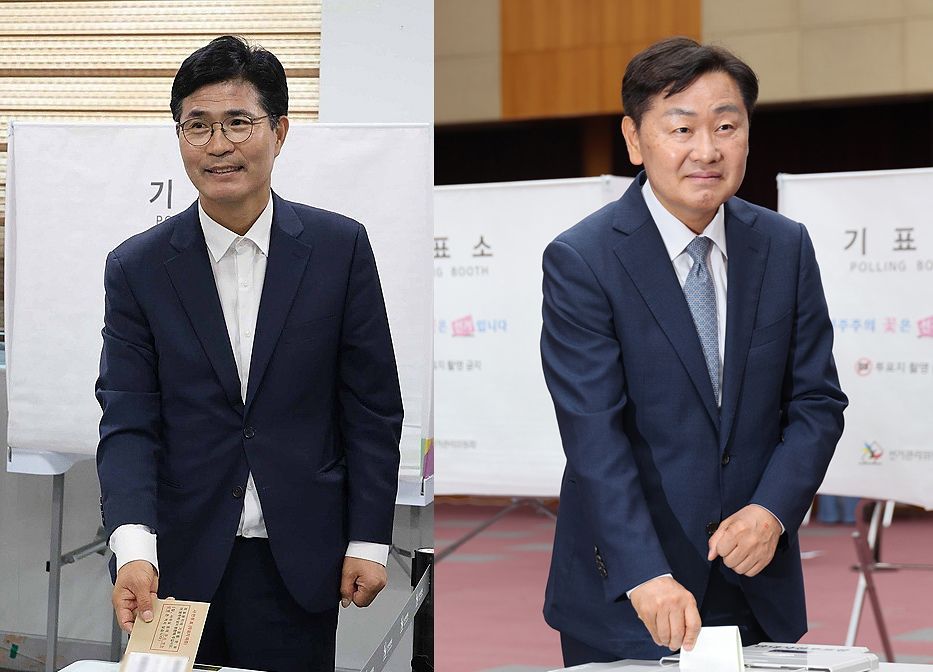 6·3 지방선거 사전투표 첫날인 지난달 29일 더불어민주당 이원택(왼쪽) 전북지사 후보와 무소속 김관영 후보가 각각 전주시내 사전투표소에서 투표하고 있다. 연합뉴스