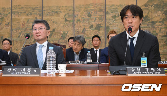 [OSEN=박준형 기자] 30일 서울 여의도 국회에서 문화체육관광위원회의 대한축구협회 현안 관련 청문회가 진행됐다.이날 청문회에는 홍명보 전 대한민국 축구대표팀 감독과 정몽규 전 대한축구협회장이 참석했다.홍명보 감독이 질의에 답하고 있다.  2026.07.30 / soul1014@osen.co.kr  사진=국회사진기자단