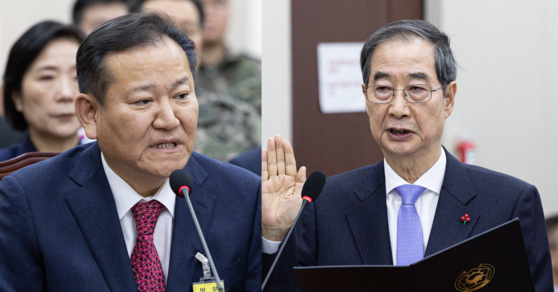 이상민 전 행정안전부 장관(왼쪽)과 한덕수 국무총리가 2025년 1월 22일 서울 여의도 국회에서 열린 윤석열 정부의 비상계엄 선포를 통한 내란 혐의 진상규명 국정조사 1차 청문회에 출석했다. 뉴스1