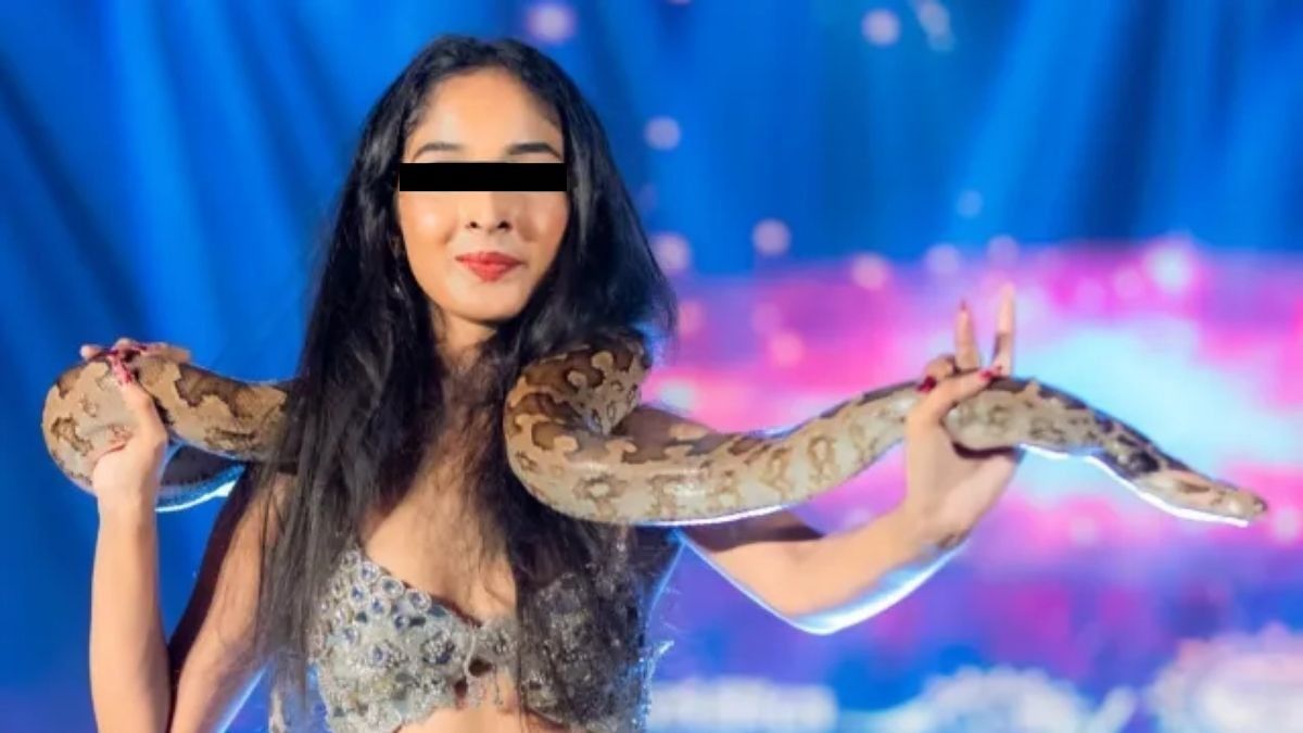 미인대회서 비단뱀과 춤췄다가 동물학대로 벌금형 선고받은 스리랑카 여성. 사진 데일리미러 홈페이지 캡처