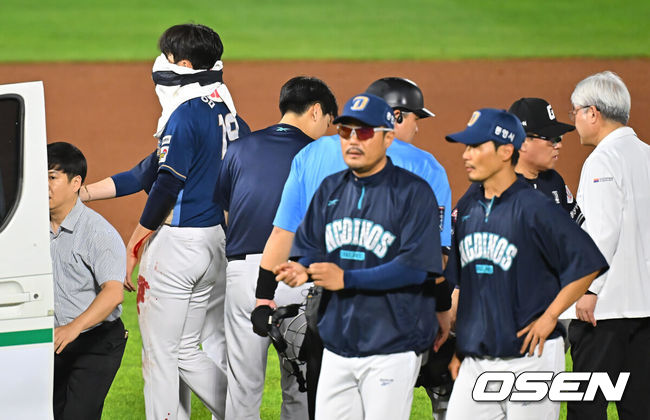 [OSEN=부산, 이석우 기자] 14일 부산 사직야구장에서 2026 신한 SOL KBO 리그 롯데 자이언츠와 NC 다이노스의 경기가 열렸다. 홈팀 롯데는 김진욱이, 방문팀 NC는 토다가 선발 출전했다.NC 다이노스 임지민이 9회말 2사 1루 롯데 자이언츠 레이예스의 타구에 맞아 구급차에 실려 병원으로 향하고 있다. 2026.08.14 / foto0307@osen.co.kr