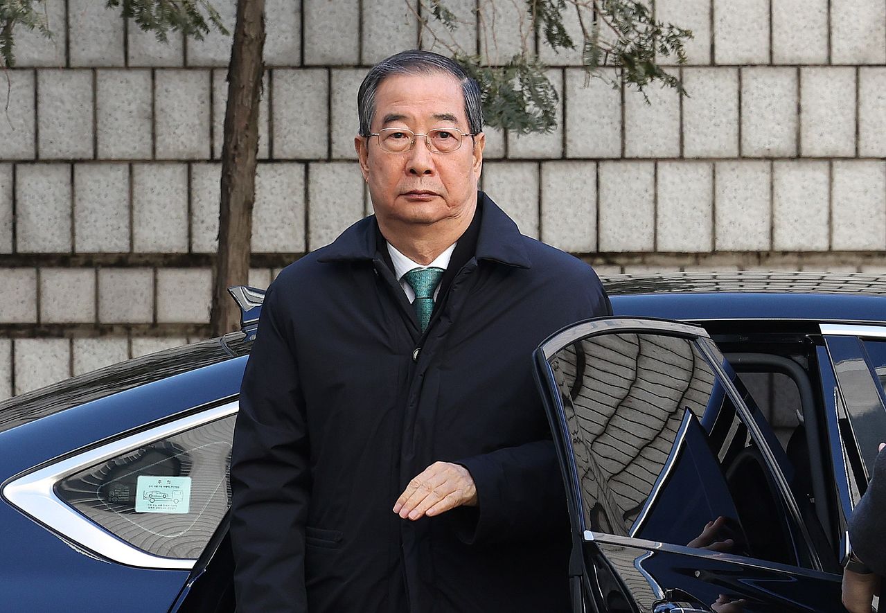 한덕수 전 국무총리가 지난 1월 21일 오후 서울 서초구 서울중앙지법에서 열린 내란 우두머리 방조, 내란 중요임무 종사 혐의 사건 1심 선고공판에 출석하고 있다. 뉴스1