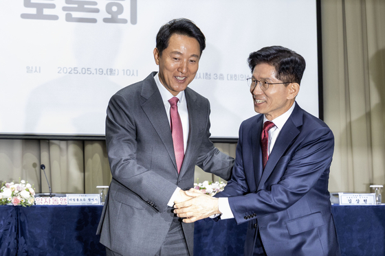 오세훈 서울시장(왼쪽)과 김문수 전 고용노동부 장관. 임현동 기자