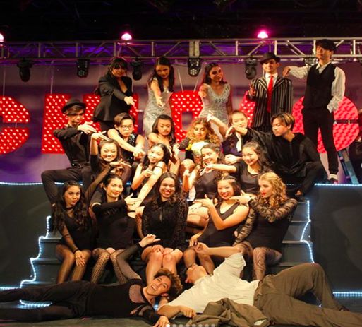 The cast points to junior, Maxime Garcia, who helped organize and direct the musical.