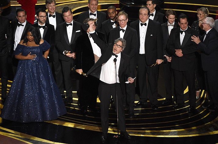 The cast of Best Picture winner “Green Book” gathered on stage to accept their award. [Source: Associated Press, Chris Pizzello, Invision] 