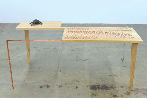 최진석의 작품 'I work, read, eat, nap on the table until my body becomes the table that becomes the building that becomes the city'.