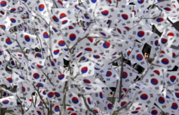 Many South Korean flags swing with pride in memory and celebration of the March First Movement 100 years ago. [Source: Associated Press, Lee Jin-man]