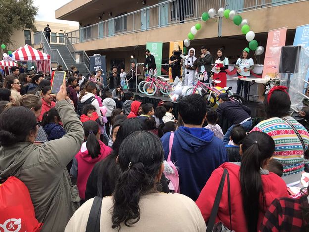 The stage at the carnival was set for music and passing out gifts to the crowd. [Source: Author, Hannah Sung]