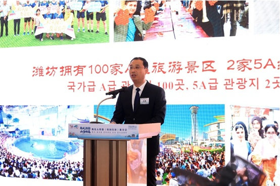 [Gao Qiang (高强), Director of the Weifang Municipal Bureau of Culture and Tourism, delivers an on-site presentation (Photo by Li Hao)]