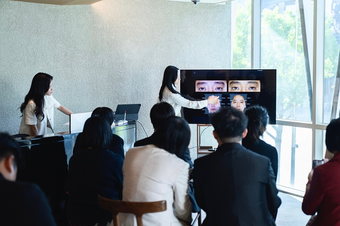 [Cheongin Research Director presenting ONFA clinical applications, case studies, and quantitative findings from 3D facial analysis]