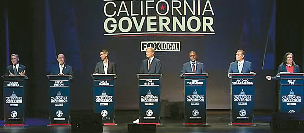 (왼쪽부터) 하비에르 베세라, 스티브 힐튼, 맷 메이핸, 톰 스타이어, 토니 서먼드, 안토니오 비야라이고사, 베티 이 후보가 토론을 벌이고 있다.  [KTVU FOX 2 캡처]